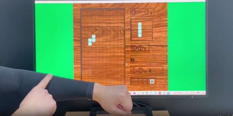 A touch-responsive fabric armband for flexible keyboards, wearable sketchpads