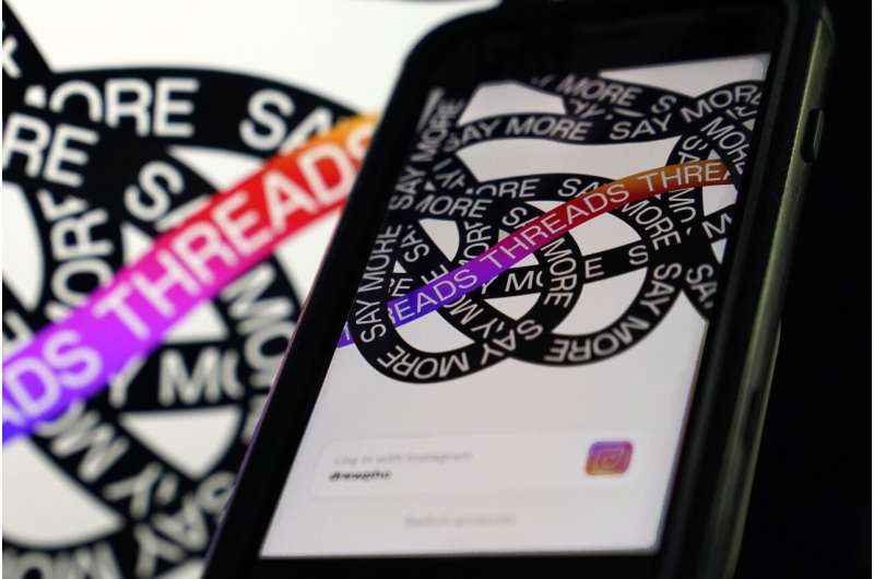 This photo, taken in New York, Thursday, July 6, 2023, shows Meta's new app Threads. Meta has unveiled an app called Threads to rival Twitter, targeting users looking for an alternative to the social media platform owned — and frequently changed — by Elon Musk. Credit: AP Photo/Richard Drew Reluctant Twitter users, influencers and others are flocking to Meta's new Threads app